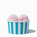Close-up of 6 oz blue ice cream cups stacked and ready to serve