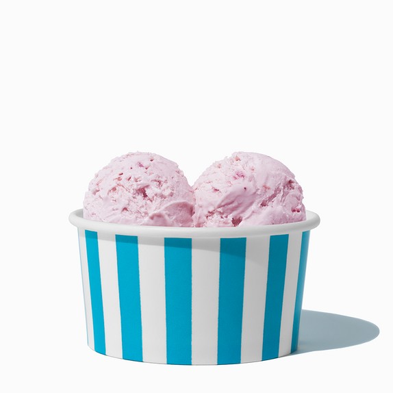 Close-up of 6 oz blue ice cream cups stacked and ready to serve