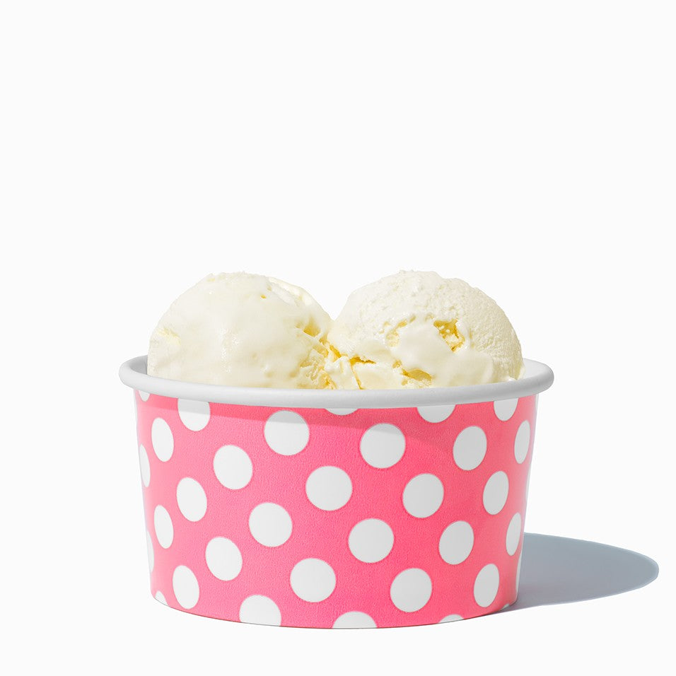 Close-up of 6 oz pink ice cream cups stacked and ready to serve