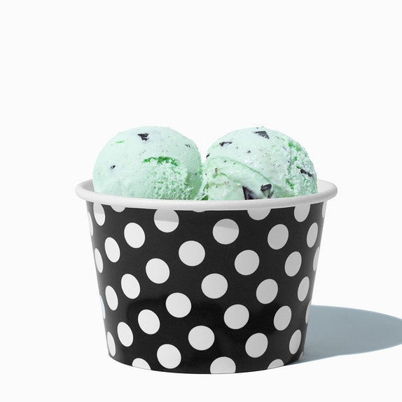 Close-up of 8 oz black ice cream cups stacked and ready to serve