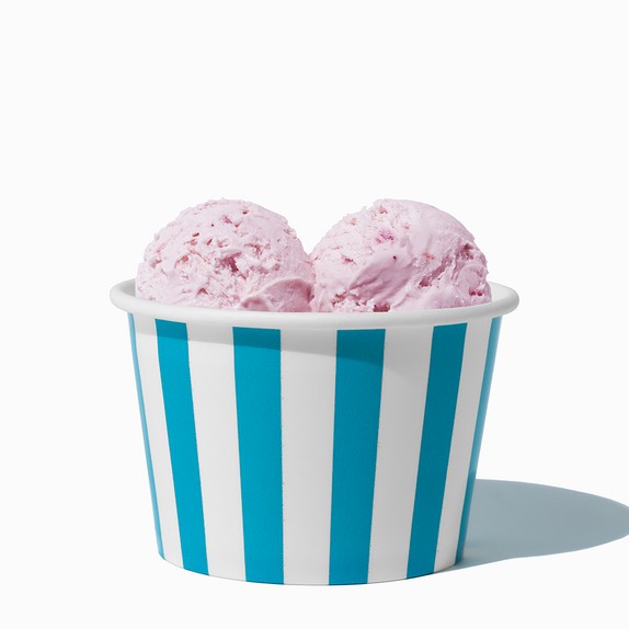 Close-up of 8 oz blue ice cream cups stacked and ready to serve