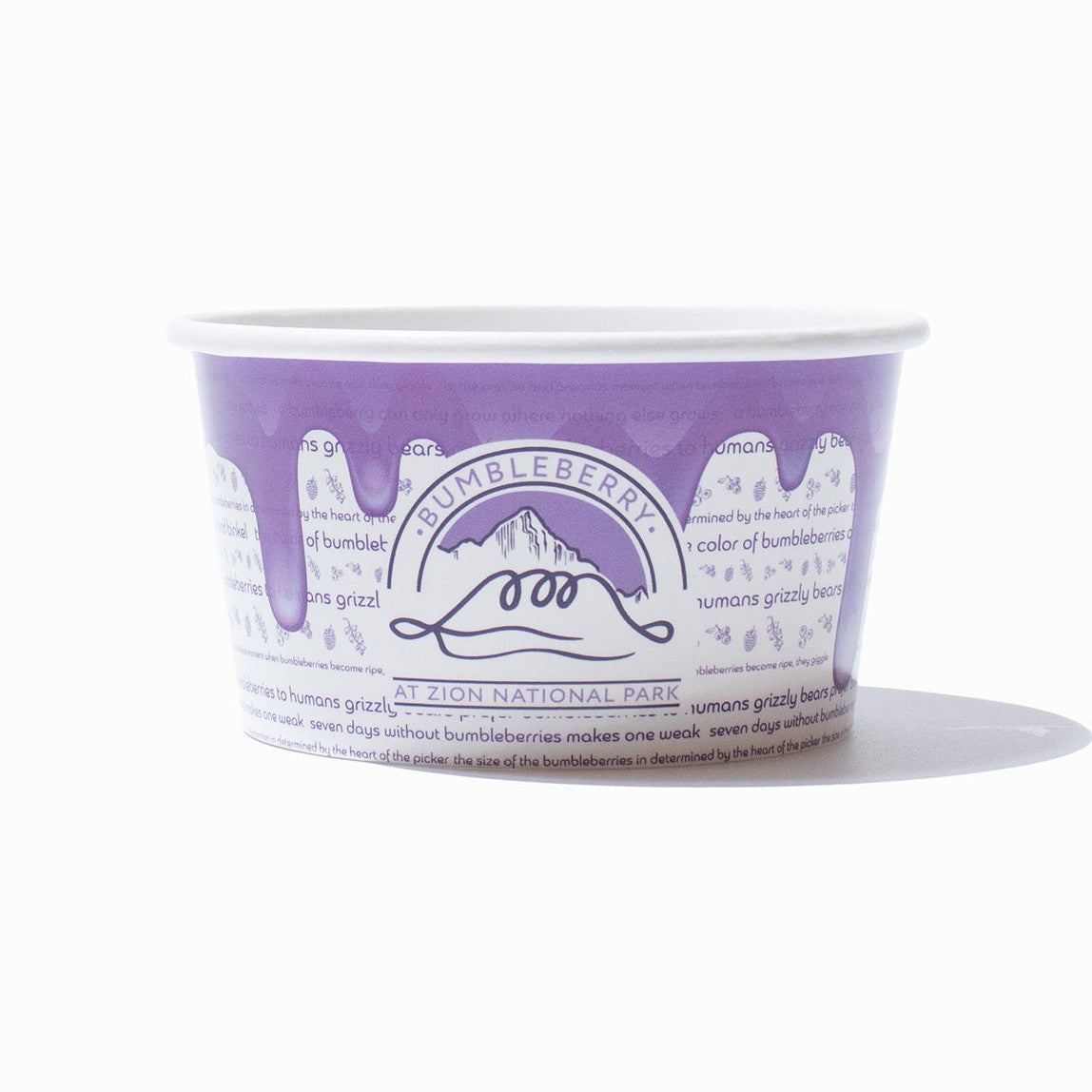 Close-up of 8 oz ice cream cups stacked and ready to serve