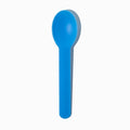 Close-up of blue tasting spoons stacked and ready to serve