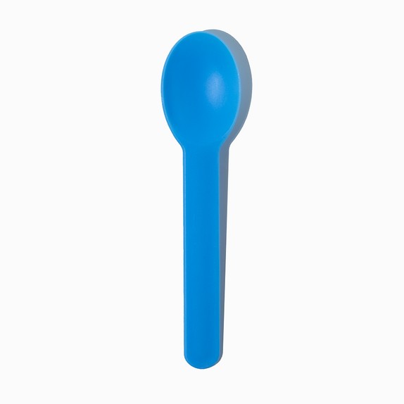 Close-up of blue tasting spoons stacked and ready to serve