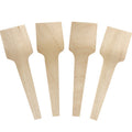 Close-up of compostable tasting spoons stacked and ready to serve
