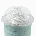 Close-up of 1 Quart clear plastic cup lids stacked and ready to serve