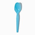 Close-up of blue tasting spoons stacked and ready to serve