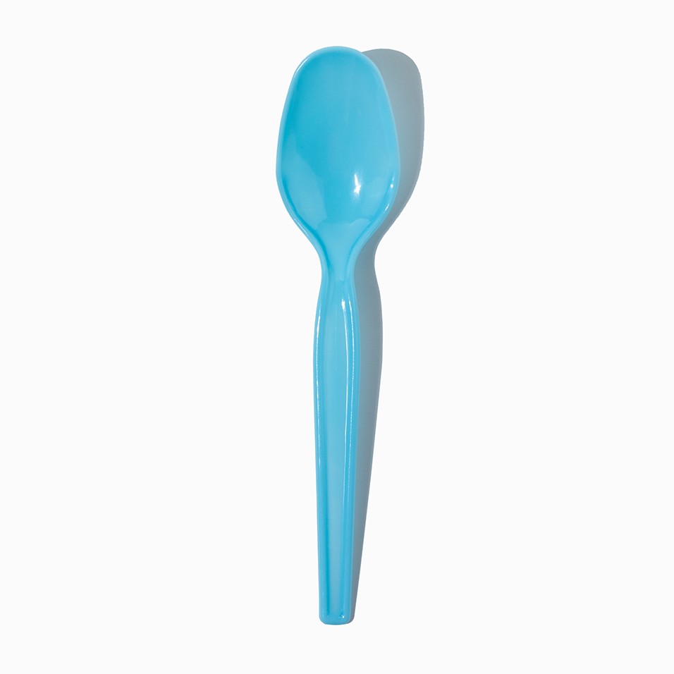 Close-up of blue tasting spoons stacked and ready to serve