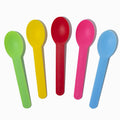 Close-up of assorted tasting spoons stacked and ready to serve