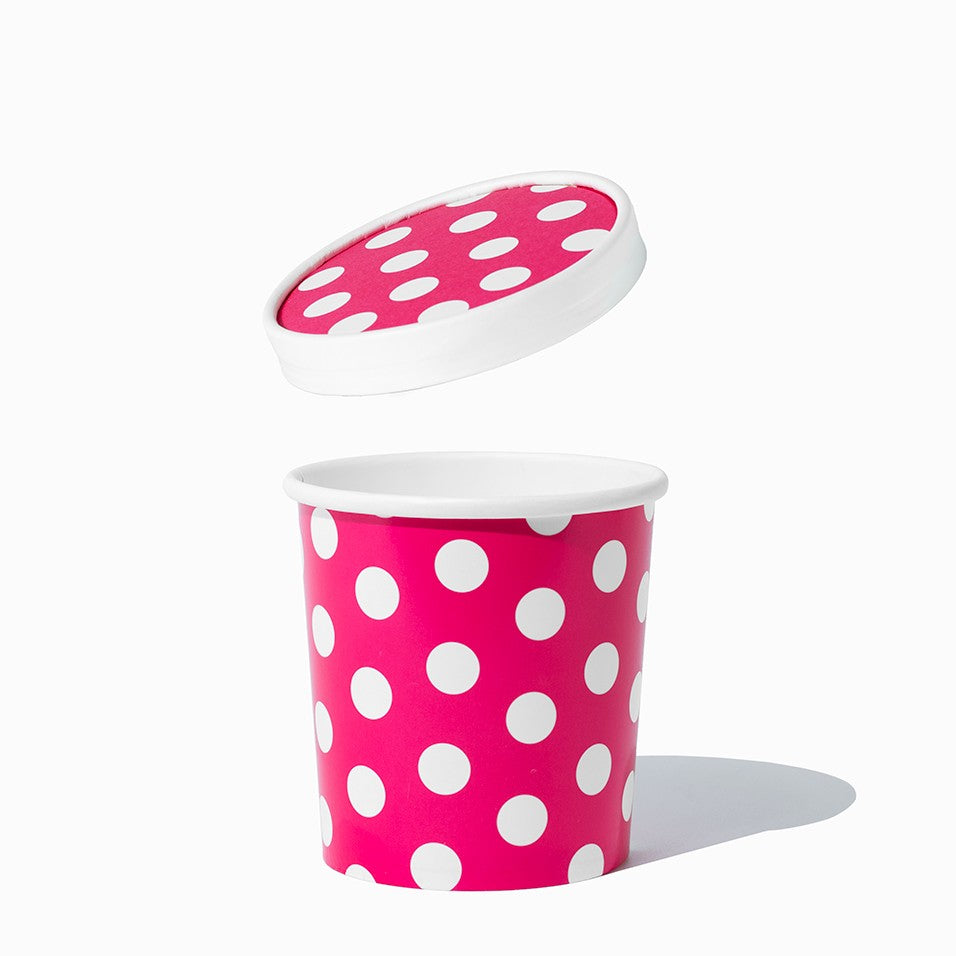 Close-up of 16 oz pink to-go containers stacked and ready to serve