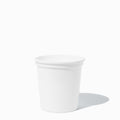 Close-up of 1 Pint white plastic to-go containers stacked and ready to serve