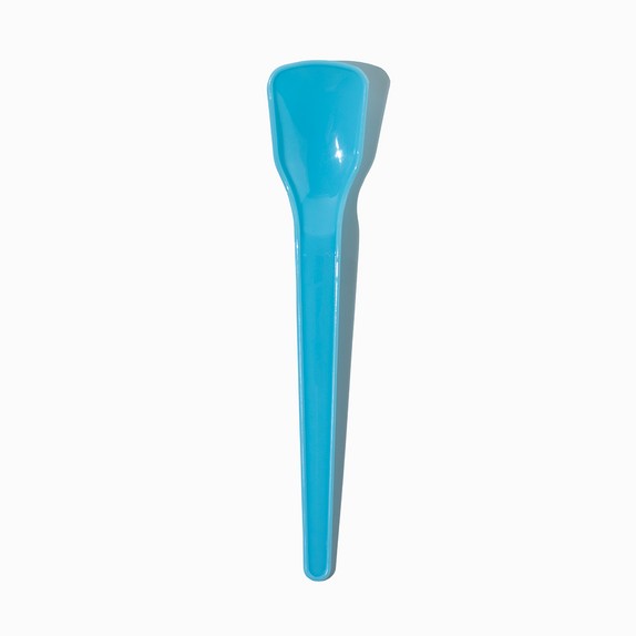Close-up of blue tasting spoons stacked and ready to serve