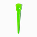 Close-up of green tasting spoons stacked and ready to serve