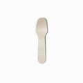 Close-up of compostable tasting spoons stacked and ready to serve